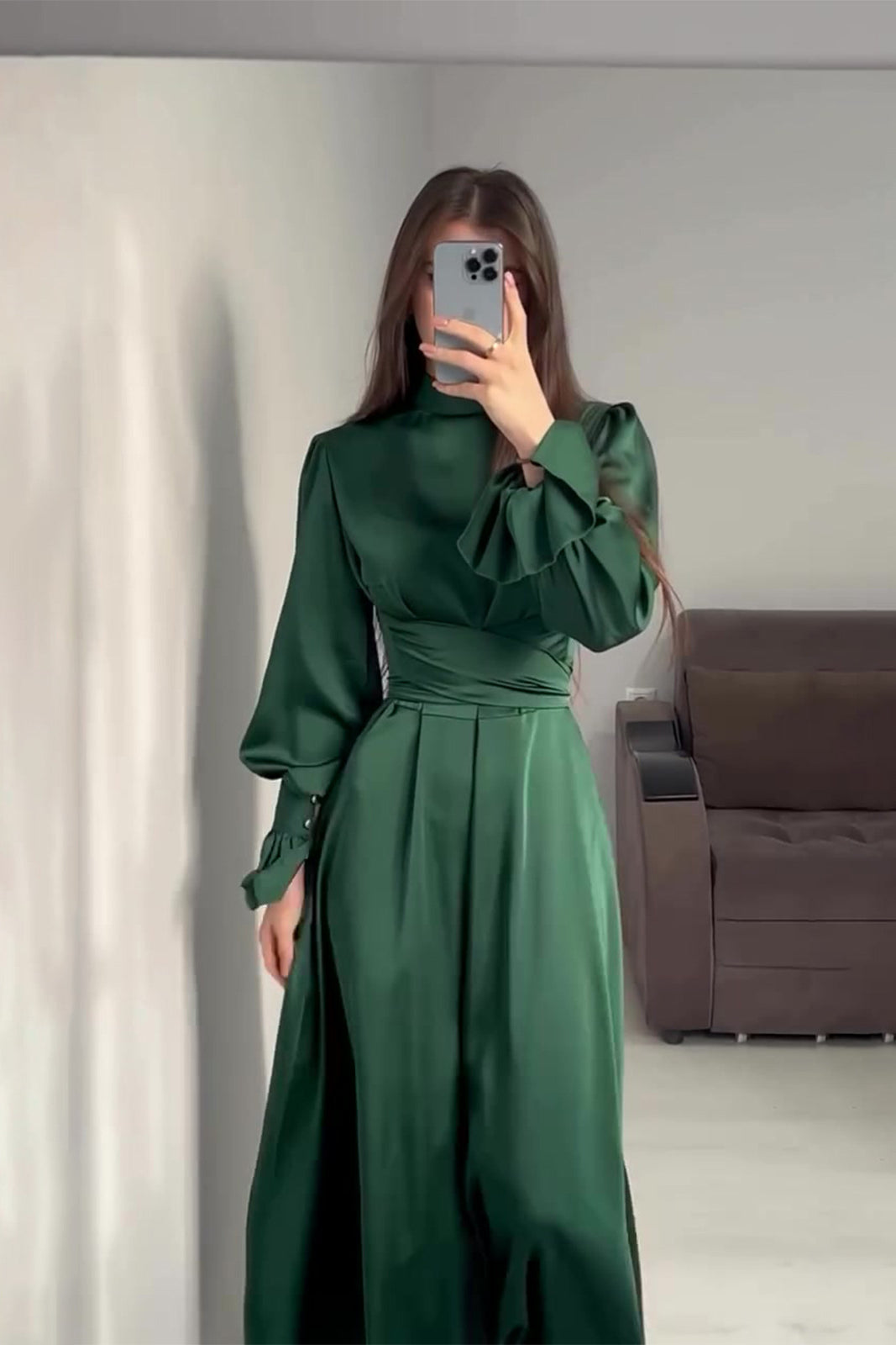 Green dress with long sleeves and puff sleeves