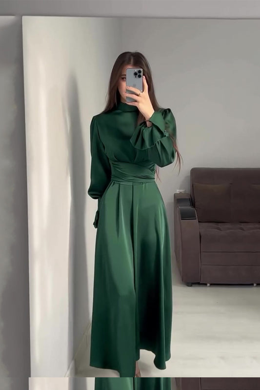 Green dress with long sleeves and puff sleeves